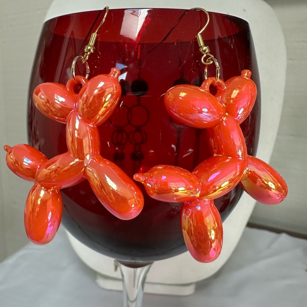 Large style orange iridescent balloon dog poodle earrings